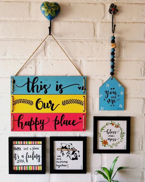 VIOLETVIBES® on Instagram: “We had to create a combo around our best selling multi tier wall hanging : 'This is our happy place' We will call it 'This is our happy…” Hanging Board On Wall, Wall Hanging Quotes Diy, Balcony Diy, Basic Calligraphy, Hanging Quotes, Diy Wall Hanging Crafts, Warli Painting, Cardboard Crafts Diy, Wall Art Diy Paint