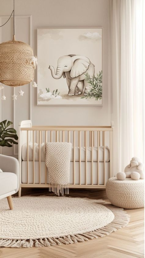 A soft, neutral baby girl nursery featuring a natural wood crib, a cozy knitted blanket, a tassel-edged cream rug, and a woven pendant light with hanging stars. A large elephant wall art adds charm, while soft, airy curtains and natural textures create a tranquil design. Baby Girl Nursery Ideas, Girl Nursery Ideas, Woven Pendant Light, Nursery Inspiration Girl, Elephant Themed Nursery, Sweet Elephant, Name Wall Decor, Elephant Canvas, Nursery Inspo