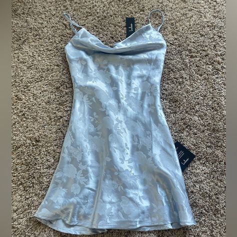 Light Blue Satin. Cowl Neck. Floral Pattern. Never Worn. Light Pink Dress Hoco, Homcom Dress, Periwinkle Hoco Dress, Non Basic Hoco Dresses, Christmas Dance Dress, Light Blue Hoco Dress Short, Light Blue Vintage Dress, Blue Light Dress, Blue Satin Mini Dress For Homecoming