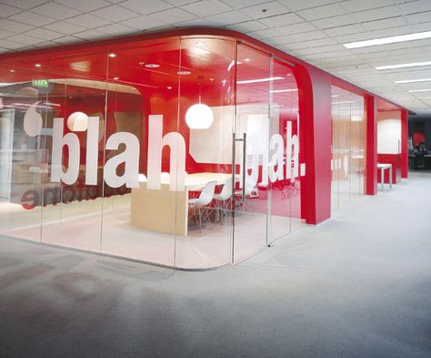 Vodafone, UK corporate office | offices that pop Red Office Design, Office Design Glass Wall, Fun Office Design Work Spaces, Glass Sticker Design Office, Frosted Film Design Offices, Glass Graphics Office, Office Glass Partition Film Design, Vodafone Office, Fun Office Design