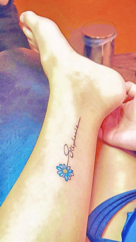 Small flower tattoos with name on ankle Name Flower Tattoo, Sunflower Tattoo Thigh, Tattoo Sites, Sunflower Tattoo Sleeve, Sunflower Tattoo Shoulder, Ankle Tattoo Designs, Daughter Tattoo, Tattoo Shoulder, Moon Tattoos