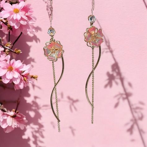 Sakura earrings �🌸🌸🌸 tuttyknitty #smallbusiness #supportsmallbusiness #smallbusinessowner #smallbusinesssupport #handmadejewelry #handmadewithlove #handmadeaustralia #handmadeaccessories my #jewelry #jewelrydesign #jewelryaddict #jewelrygram #jewelrymaking #jewellerygram #aesthetic #y2k #y2kfashion #waterproofjewelry #nontarnishjewelry #hypoallergenicjewelry #jewelryinfluencer #jewelrylover #jewelrybusiness #jewelryfashion #fashionblogger #fashionjewelry #jewelryoftheday #jewelryblogger Sakura Earrings, Earrings Kawaii, Pink Sakura, Chain Earring, Aesthetic Y2k, Korean Art, Hypoallergenic Jewelry, Waterproof Jewelry, Jewelry Business