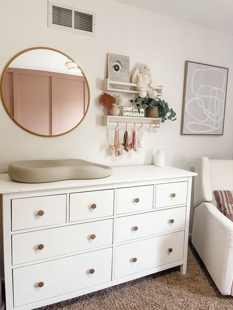 Sweet + Simple Nursery Design | The After Nursery With Two Dressers, Nursery Dresser And Mirror, Caden Lane Wren Nursery, Over Nursery Dresser Decor, Round Mirror Above Dresser Nursery, Nursery Ideas Above Dresser, Nursery Decor Over Dresser, Neutral Nursery Dresser Decor, Nursery Dresser Shelves