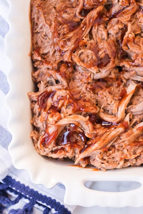 This classic barbecue pulled pork recipe is about to amplify your kitchen game. With a few simple ingredients tossed into the Crock Pot, you'll have smoky, indulgent BBQ Pork Tenderloin in just about 4 hours--or less! #BBQpulledpork #pulledpork #BBQpork #BBQ #barbecuepulledpork #slowcookerpulledpork #crockpotpullerpork Pulled Pork Tenderloin Slow Cooker, Best Slow Cooker Pulled Pork, Barbecue Pork Roast, Barbecue Pork Tenderloin, Pork Tenderloin Crock Pot Recipes, Pulled Pork Tenderloin, Bbq Pork Roast, Barbecue Pulled Pork Recipe, Pork Roast Crock Pot Recipes