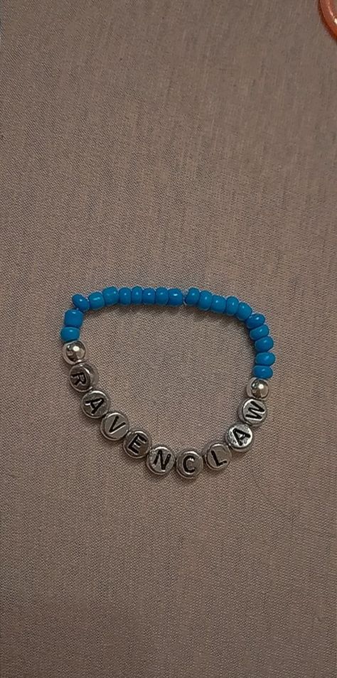 harry potter ravenclaw beaded bracelet made with blue seed beads and silver letter beads Ravenclaw Bracelet, Beaded Bracelets Ideas, Harry Potter Ravenclaw, Bracelets Ideas, Ravenclaw, Wizarding World, Infinity Bracelet, Beaded Bracelet, Harry Potter