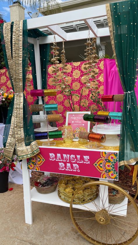 Bangle bar Chooda Ceremony Decor, Henna Station At Party, Indoor Mehndi Decor, Bangle Station Mehendi, Mehendi Set Up, Mehendi Stall Ideas, Punjabi Reception Decor, Indian Wedding Diy Decor, Mendhi Party Decor