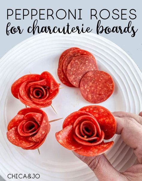 Easily make pepperoni roses to include in a charcuterie board. How To Make Roses Out Of Pepperoni, Kentucky Charcuterie Board, Rose Out Of Pepperoni, Pepperoni For Charcuterie, How To Make A Rose Out Of Pepperoni, Pepperoni And Cheese Charcuterie Board, Charcuterie Pepperoni Rose, Charcuterie Board Pepperoni Rose, How To Make Charcuterie Roses