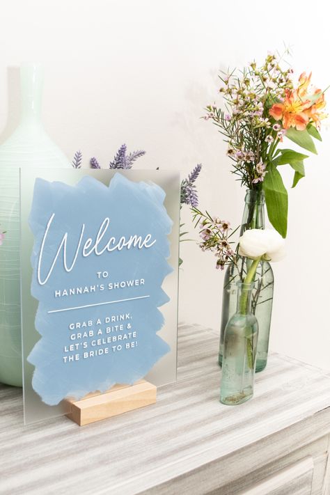 Acrylic Party Decor, Bridal Shower Cricut, Blue Theme Bridal Shower Ideas, Welcome Sign Bridal Shower Diy, Bridal Shower Cricut Ideas, White And Blue Bridal Shower Ideas, Cricut Bridal Shower Ideas, Blue Wedding Shower Ideas, Blue Themed Bridal Shower Ideas