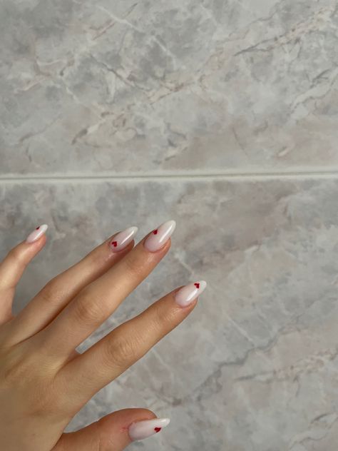 Nails with small red hearts Small Hearts Nails, Small Hands Nails, Milky Heart Nails, Clear Nails With Hearts, Milky White Nails With Heart, White Pretty Nails, Small Heart Nails, Nails With Small Heart, Cute Nails With Hearts