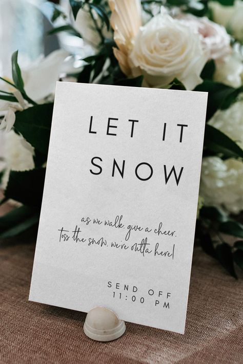 A playful wedding sign encouraging guests to celebrate the newlyweds' departure with a festive "snow-like" confetti toss, infused with wit and charm. Let It Snow Wedding Send Off, Christmas Wedding Send Off Ideas, Snow Wedding Exit, Fake Snow Send Off Wedding, Winter Wedding Sendoff, Snow Machine Wedding Exit, Fake Snow Wedding Send Off, Snow Send Off Wedding, Luxury Christmas Wedding