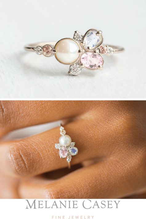 The Pearl Sands Ring features a cluster of gemstones, including an Akoya pearl, a moonstone, a morganite, peach zircon, and white diamonds. Available now in 14k white gold at melaniecasey.com! Custom Pearl Ring, Pearl And Birthstone Ring, Unique Engagement Rings With Pearls, Pearl Diamond Sapphire Ring, Pearl And Moonstone Ring, Pearl Cluster Engagement Ring, Pearl Ring Settings, Pearl Ring With Diamonds, Unique Pearl Rings