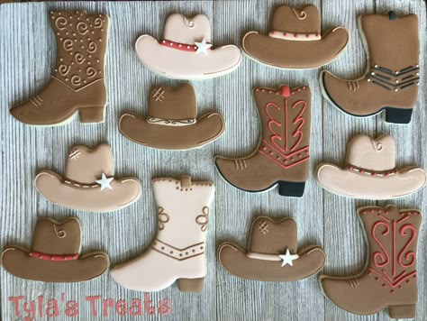 Cowboy boots and hat cookies  www.facebook.com/tylastreats Cowboy Boots Decorated Cookies, Decorated Cowboy Cookies, Cowboy Themed Cookies Decorated, Royal Icing Cowboy Cookies, Cowboy Hat Royal Icing Cookies, Country Cookies Decorated, Boots And Bubbly Cookies, Cowboy Hat Sugar Cookies, Cowboy Boot Sugar Cookies