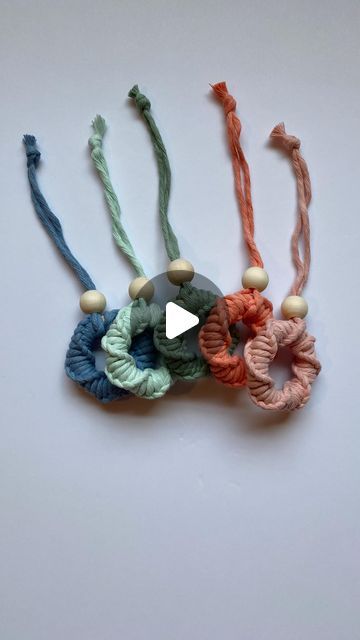 Megan | Macrame Gifts & Tutorials on Instagram: "Ornaments✨

#handmademarket #behindthescenes #howto #macrame #megsmodernmacrame #shopmegsmodernmacrame #macrameshop #handmadecommunity #macramemakers #macramegift #macrameidea #diy #keychains #howtomacrame #gatheringknot #beginnerknot #beginnermacrame #beginnerartist #macramemovement #fiberart #keychaindiy #macramebraid #macramekeychain #macramecharm #fiberart #macramechristmas #relaxingtutorial #shophandmade #farmersmarket #macramemarket #macramé" Macrame Gifts, Diy Keychains, Handmade Market, Macrame Ideas, Diy Keychain, Handmade Shop, Fiber Art, Keychains, Macrame