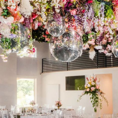 DISCO DREAMIN' I love how versatile disco balls are! Add some chains or florals, foliage or fabric, or even a streamer hangin' and You have a look for every occasion! For more Disco Dreamin' inspo head to our Pinterest! (link in bio) . . . . . *not styled by The Different Darling, just loving the look! Disco Chandelier, Disco Balls, Just Love, Link In Bio, I Love, Floral, Fabric, Quick Saves