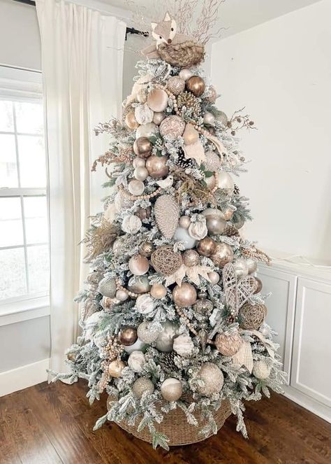 White Tree With Silver Decorations, Cream And White Christmas Tree Decor, Good And White Christmas Tree, Christmas Tree Bohemian, Beige And Red Christmas Tree, Silver White And Gold Christmas Tree, Silver Gold White Christmas Tree, White And Cream Christmas Tree, How To Decorate A Flocked Christmas Tree