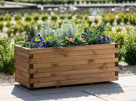 Add drainage to the bottom of your planters to help keep your plants healthy. In this guide, we share what to put in a planter for drainage. Raised Flower Bed, Wooden Trough, Trough Planter, Raised Flower Beds, Trough Planters, Garden Screening, Watering & Irrigation, Small Planter, Wood Planters