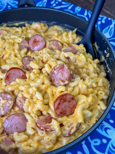 Delicious coins of browned Smoked Sausage nestled into a skillet of mac and cheese on a blue and white napkin. Smoked Sausage Mac And Cheese, Sausage Mac And Cheese, Baked Pasta Casserole, Kielbasa And Potatoes, Pulled Pork Nachos, Slow Cooker Casserole, Pork Nachos, Quick Family Meals, Easy Skillet Meals