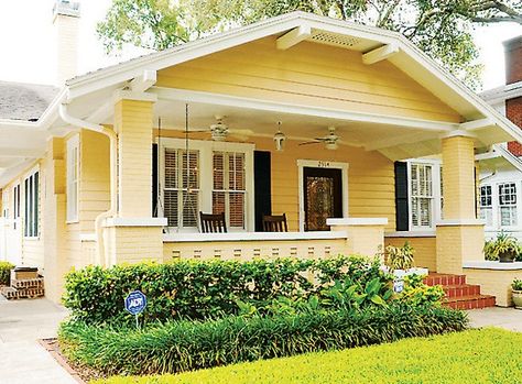 covered front porch | yellow house and covered front porch | Dream House Yellow Bungalow Exterior, Bungalow Exterior Colors, Stucco Columns, Yellow House Exterior, Craftsman Bungalow Exterior, Black Shutters, Craftsman Bungalow, Bungalow Exterior, Craftsman Exterior