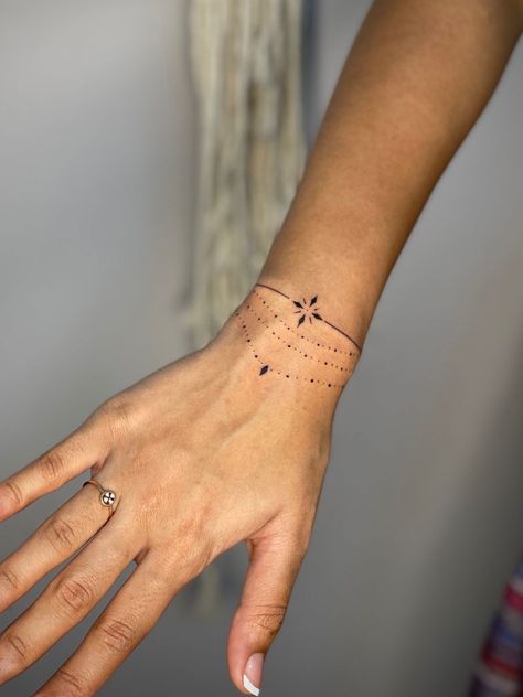 Wrist Ornament Tattoos, Arm Band Tattoo Women, Wrist Cuff Tattoos For Women, Tattoo Bracelet Wrist, Wrist Tattoo Ideas Female, Wrist Bracelet Tattoos For Women, Hand Band Tattoo, Bracelet Tattoos For Women, Small White Tattoos