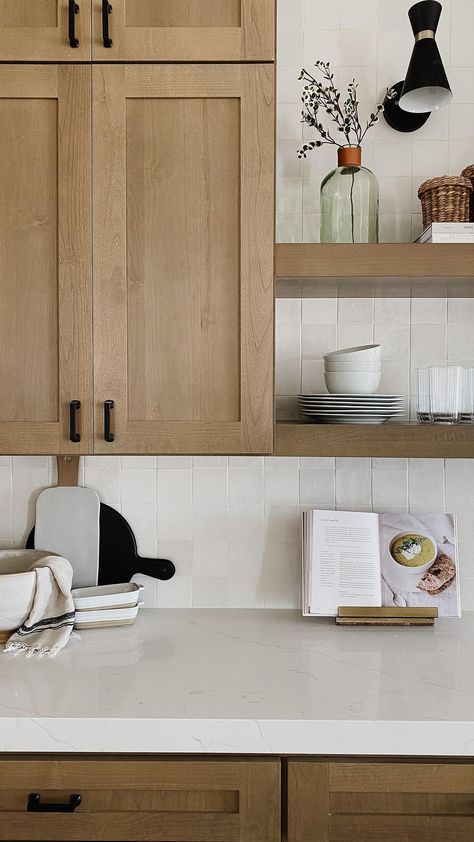 Can’t stop starring at how beautifully this kitchen styling came together at this custom build we just wrapped up! Shop this look with my… | Instagram Kraftmaid Saddle Cabinets, Wood Cabinets And Backsplash, 12 Ft Island Kitchen, Soft Maple Kitchen Cabinets, Poplar Kitchen Cabinets, Kitchen Cabinet Wrap, Oak Wood Cabinets Kitchen, Walnut Stained Kitchen Cabinets, Natural Wood Kitchen Cabinets Modern