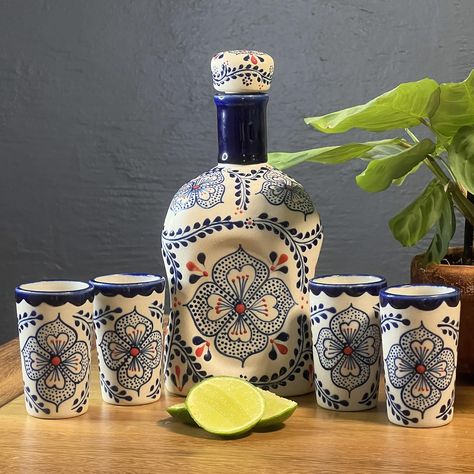 PRICES MAY VARY. HANDCRAFTED IN MEXICO - These unique CERAMIC pieces are handmade and hand-painted in the traditional talavera style in the heart of Mexico by skilled artisans. Each set comes with a ceramic tequila decantor and 4 ceramic tequileros (shot glasses) UNIQUE TEQUILA GIFT SET - Painted entirely by hand each liquor decanter and tequila sipping glasses contain small variations making it a one of a kind gift for tequila drinkers. Included in each set is a card signed by the artisan that Tequila Gift Basket Ideas, Tequila Decanter, Tequila Glasses, Tequila Gifts, Liquor Decanter Set, Townhouse Kitchen, Mexican Tequila, Honey Store, Tequila Gift