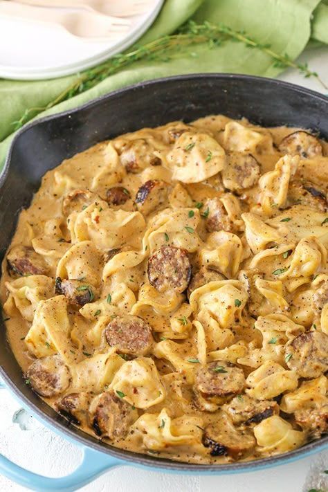 Smoked Sausage Tortellini Alfredo, Cajun Tortellini Alfredo, Brats Sausage Recipes, Smoked Sausage And Tortellini Recipes, Brat Meal Ideas, Cajun Tortellini Pasta, Brat Meals, Sausage Link Recipes Dinners, Brat Pasta