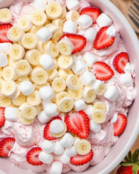 Easy and irresistible, this Strawberry Banana Cheesecake Salad recipe is your go-to for gatherings—find out how to whip up this crowd-pleaser! Strawberry Banana Desserts Easy, Strawberry Banana Salad Recipe, Strawberry Banana Pie Recipe, Strawberry Banana Salad, Strawberry Banana Fluff Salad, Strawberry Cheesecake Fluff, Strawberry Crunch Banana Pudding, Strawberry Banana Cheesecake Salad Easy, Fluffy Salad