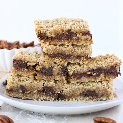 delicious food, always gluten-free. Oatmeal Carmelitas, Chocolate Caramel Cookie Bars, Gluten Free Cookie Bars, Melted Caramel, Meaningful Eats, Gluten Free Oatmeal Cookies, Chocolate Caramel Cookies, Caramel Cookies Bars, Oatmeal Cookie Bars