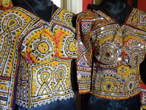 Two awe-inspiring hand embroidered Rabari choli for sale at Adventuress exhibition "Thread Songs". Rabari Embroidery, Golden Aura, India Textiles, Navratri Festival, Afghan Jewelry, Backless Blouse, Orange Velvet, North India, Boho Bags