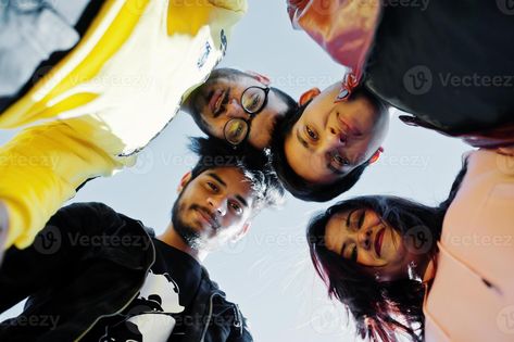 Group of four asian people friends stand on and looking at camera down. People Looking Down At Camera, Group Looking Down At Camera, Looking Down At Camera Reference, Looking Down At Camera, Group Of Four, Camera Drawing, Art Student, Pose References, Group Of People