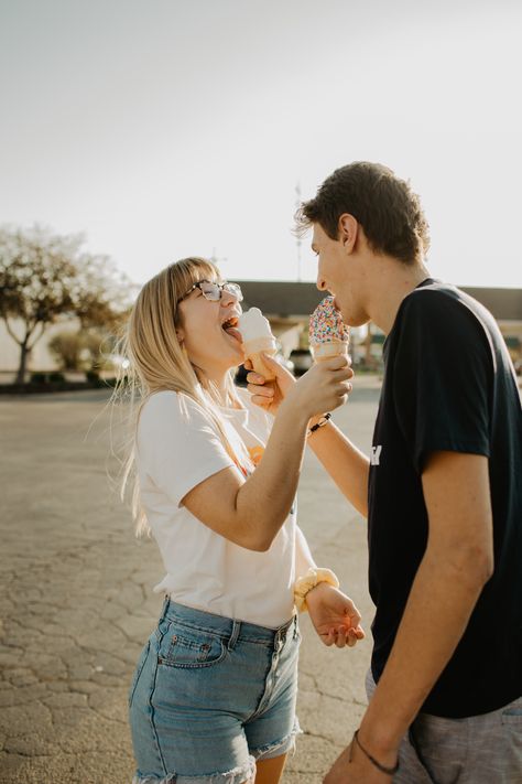 Who else loves ice cream?! Loved this cute couple session during golden hour. We started off the session at a little ice cream shop and then wandered around downtown as the sun set!   #coupleshoot #icecream #sprinkles #love #engagementsession #funshoot #love #goldenhour #sunsetshoot  Photographer: Emily DeKoster Couple Ice Cream Pictures, Food Couple Photoshoot, Engagement Photos With Ice Cream, Engagement Photos Ice Cream Shop, Ice Cream Parlor Engagement Photos, Fun Couples Photoshoot Poses, Eating Engagement Photos, Ice Cream Couple Aesthetic, Stranger Session Photography