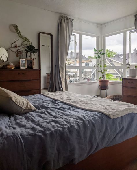 This is our primary bedroom. With windows facing north and east, our plants are very happy! East Facing Bedroom, Apartment In Canada, Bedroom With Windows, Canada Apartment, Primary Bedroom, London Apartment, Bedroom Windows, One Bedroom Apartment, Photo Styling