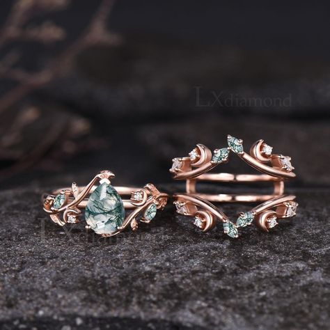 Item description ✦ Handmade, high-quality item! ✦ Material: 925 sterling silver, Solid 10k/14K/18K GOLD (can be made in white/rose/yellow gold) Engagement ring ✦ Center stone: Natural Green Moss Agate. ✦ Size/Weight: 6x8mm Pear Cut ✦ Side stones: Marquise Cut Natural Green Moss Agate and Round Cut Moissanites Wedding band ✦ Gemstones: Natural Green Moss Agates and Moissanites Any ring size can be made,if the ring size is not in the option list ,contact me. As it is handmade,it needs 3-4 weeks to finish and then be shipped by usps or DHL. Return policy: We offer 30 days return policy. For any reason, if you are not completely satisfied with your order, you may return it for a refund.  Buyer is responsible for the handcraft fee (15%-30% of the total price) and the return shipping cost. Sage Green Wedding Rings, Gold And Green Wedding Ring, Rings Engagement Vintage, Untraditional Wedding Rings, Fairy Engagement Ring, Green Wedding Ring, Moss Agate Wedding Band, Art Deco Moon, Green Moissanite Engagement Ring