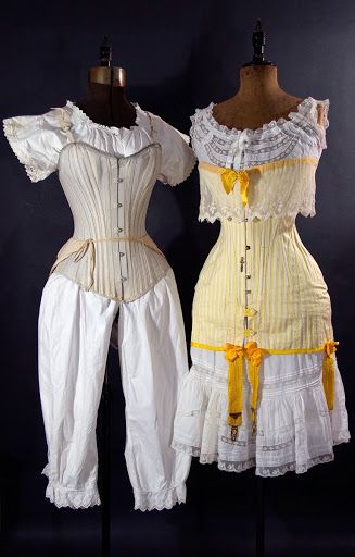 Left: grey cotton long line corset worn over one piece cami-knickers, and additional bustle pad tied around waist, c. 1895. Right: Yellow and white striped... Historical Garments, Art Gallery Museum, 1860s Fashion, Edwardian Corsets, T Photo, Victorian Era Fashion, Gallery Museum, Period Pieces, Historical Dress