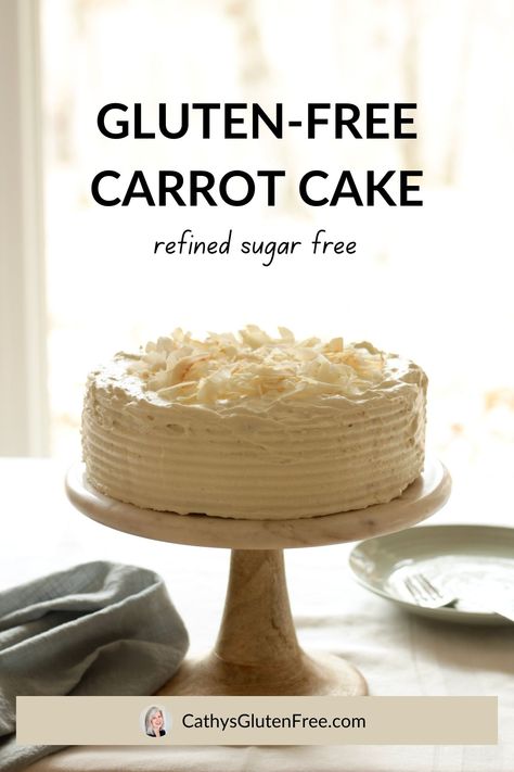 a frosted layer cake topped with pineapple flakes sits on a pedestal plate in front of a window. Gluten Free Carrot Cake Recipe, Dairy Free Carrot Cake, Cake With Pineapple, Carrot Cake With Pineapple, Gluten Free Carrot Cake, Bread Snacks, Snacks And Desserts, Carrot Cake Recipe, Pineapple Coconut