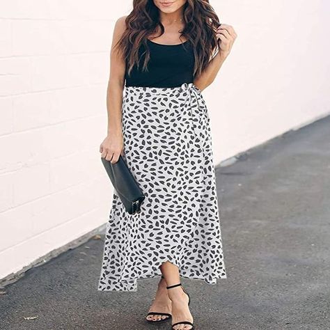 A maxi animal-print skirt available in a variety of styles and prints so you can get a lil' wild in a number of comfy ways. Wrap Skirt Black, Casual Summer Skirt, Bohemian Maxi Skirt, Printed Long Skirt, Bohemian Maxi, Animal Print Skirt, Beach Wrap, Beach Skirt, Long Maxi Skirts