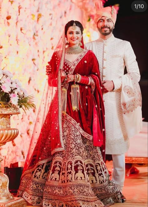 Reception Dress For Groom Indian, Reception Couple Dress Indian, Bridal Lehenga Red Royal, Paradise Wedding Theme, Bridal Lehenga Look, Bride And Groom Indian Wedding Outfit, Lehenga Designs 2023, Groom Indian Wedding Outfits, Wedding E Invite