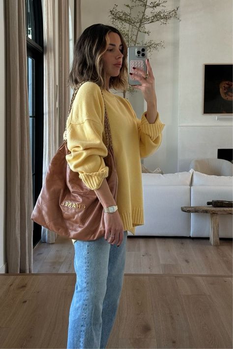 For spring, we're wearing lighter colors in heavy fabrics. I love pairing jeans with a pastel sweater, like this butter yellow sweater. If you need casual mom outfit ideas or spring outfit ideas, I'm your girl. details are linked here, so tap to shop and be sure to scroll around to see the other looks I'm styling! Butter Yellow Sweater, Bright Yellow Sweater Outfit, Light Yellow Sweater Outfit, Pastel Yellow Outfits, Yellow Pullover Outfit, Yellow Outfit Winter, Yellow Winter Outfits, Yellow Casual Outfit, Pastel Sweater Outfit