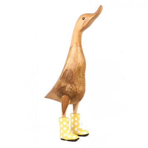 This cute natural finish large wooden duck stands approximately 30cm high with yellow and white spotted welly boots.