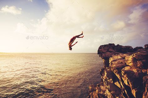 Cliff Jumping by EpicStockMedia. Cliff Jumping into the Ocean at Sunset, Summer Fun Lifestyle#EpicStockMedia, #Ocean, #Cliff, #Jumping Fitness Friends, Music Makeup, Bali Guide, Cliff Jumping, Dog Model, Cliff Diving, Friends Girl, Dream Beach, Beach Design