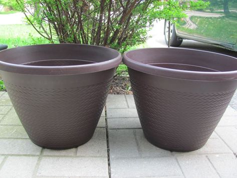 I've always wanted to have a pair of tall planters for my front porch but I couldn't justify the cost, given I have no budget for such non-essentials. Costco has a pair for $159 and Wayfair sells them for $70.99 each. Then it occurred to me that the side table project I did last year, could just as easily serve as a template for planters, too! So, off to the dollar store I went. This time, I bought four of the largest plastic pots I could find in the same colour as my side table. Th… Diy Tall Planters Outdoor Cheap, Diy Large Planters Outdoor Cheap, Front Porch Pots, Couch Makeover, Porch Pots, Boost Curb Appeal, Diy Concrete Planters, Winter Planter, Porch Planters