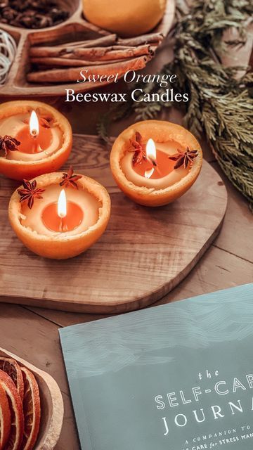 Daniella Esposito on Instagram: "Our favourite orange beeswax candles that went viral last year. 🍊 We love making these during the cozy season. NOTE: You can simply create using beeswax if you don’t feel comfortable with essential oils. Additionally, be sure to use within 3-5 days. If kept too long, the peel will create mold. Compost after using. Ingredients: 🍊100% Pure beeswax 🍊Essential oils (OPTIONAL) 🍊100% cotton wick 🍊Natural sweet oranges 🍊Cloves Directions: Melt your beeswax using a double boiler on med/low heat. Cut oranges in half. Clean out inside of oranges (we saved the insides for smoothies). Prep your wicks and place onto oranges. Now that oranges are prepped, your may OPTIONALLY add your essential oils to the melted beeswax and stir (depending on how much wax you use, Diy Orange Candle, Christmas Beeswax Candles, Aesthetic Lighting, Intentional Gifts, Diy Cleaner, Beeswax Candles Diy, Herbal Candles, Candles Burning, Homestead Kitchen