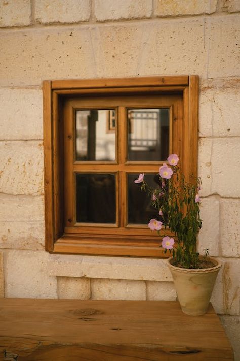 Exterior Design of Wooden Window Frame with Potted Flowers on Wood Table · Free Stock Photo Wooden Window Design, Wood Window Frame, Wooden Window Frames, Potted Flowers, Faux Brick, Wooden Windows, Bathroom Windows, Wood Windows, Window Frames