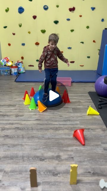 More Than A Gym on Instagram: "A body activity for single leg stance balance to kick over the cone, squat for lower extremity strength, and balance on the uneven surface when throwing the bean bags!  #morethanagym #pediatricpt #pediatricphysicaltherapist #pediatricphysicaltherapy #physicaltherapy #balance #bosu #bosuballworkout #bosuball #kidsactivities #kidsactivity #childdevelopment #motorcontrol" Balance Activities For Kids, Grandchildren Activities, Ankle Strengthening Exercises, Bosu Ball Workout, Toddler Gym, Occupational Therapy Kids, Pediatric Physical Therapy, Balance Training, Occupational Therapy Activities