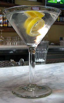 The Vesper Martini [3 Parts of London dry Gin,1 Part of Vodka, ½ Part of Kina Lillet or Lillet Blanc, a slice of lemon peel] Vespa Martini, Freshman Formal, Bartender 101, Movie Cocktails, Best Vodka Drinks, Babette's Feast, Vesper Martini, James Bond Party, Cocktail Mixology