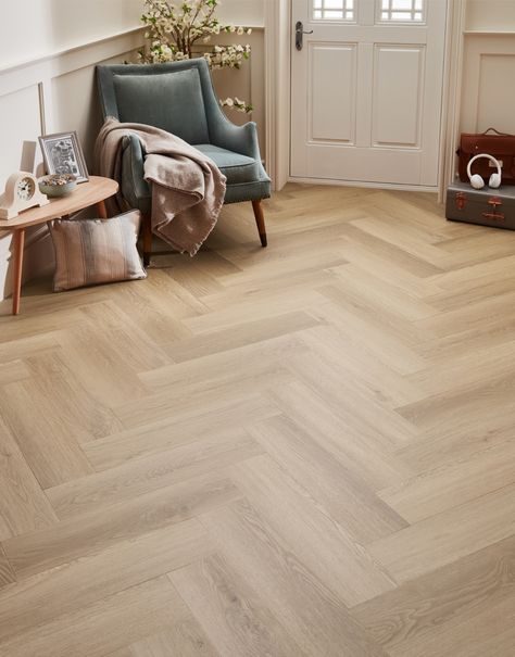 Discover the charm and resilience of Asenso Royal Herringbone, the perfect flooring choice for those who desire both beauty and practicality. Asenso Royal Herringbone offers the timeless look of natural wood. It’s waterproof, scratch-resistant, and incredibly easy to maintain, making it the perfect choice for busy households. With a wide range of stunning designs you can effortlessly enhance any room in your home. To complete your purchase and ensure a hard-wearing finish, we recommend usin Herringbone Flooring Bedroom, Hallway Ideas Flooring, Herringbone Floor Living Room Modern, Floor Colour Ideas, Herringbone Floor Entryway, Herringbone Bedroom Floor, Hallway Herringbone Floor, Herringbone Wood Flooring, Lvt Herringbone Flooring