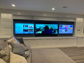 Multiple TV Wall - Farmhouse - Basement - DC Metro - by Custom Works AV Inc | Houzz Multiple Tv Wall Design, Gaming Room 2 Tvs, Multiple Tvs In Basement, Double Tv Game Room, Basement Multiple Tv Wall, 2 Tvs In Living Room, Basement Multiple Tv Wall Ideas, Two Tvs In One Room Ideas Tv Walls, 3 Tv Setup Man Cave