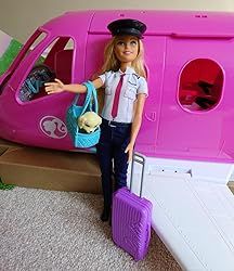 Imaginations can take off to anywhere with Barbie pilot doll in the Barbie Dreamplanethat doubles as a vehicle and a playset!
​More than 15 pieces -- including a puppy travel companion -- provide the ticket to fun!
​Push it on its rolling wheels to taxi on the runway.
​Open the top and side to reveal the inside and create a play space to play out the flight! Barbie Doll Carrying Case, Barbie Fairytopia Playset, Snack Cart, Barbie Playsets 2000s, Barbie Playsets 90s, 1990s Barbie Playsets, You Can Be Anything, Toy Puppies, A Puppy