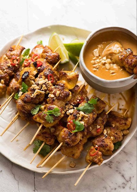 Chicken Satay skewers with Thai Peanut Sauce on a plate, ready to be eaten Satay Chicken Recipe, Chicken Satay With Peanut Sauce, Thai Chicken Satay, Sauce Satay, Chicken Satay Skewers, Chicken Satay Recipe, Satay Recipe, Satay Chicken, Mapo Tofu