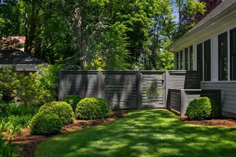 A dark gray fence is a bold backdrop for a gallery of sculptural plants, which becomes increasingly more lush as the backyard recedes.

#Offshoots #KateKennen #PHYTO #Phytoremediation #LandscapeArchitecture #Garden #Residential

Location: Newton, MA Dark Green Fence Garden, Gray Fence Backyard, Dark Privacy Fence, Gray Fence Ideas, Black Painted Fence, Dark Gray Fence, Black Fence Backyard, Backyard Bushes, Dark Grey Fence